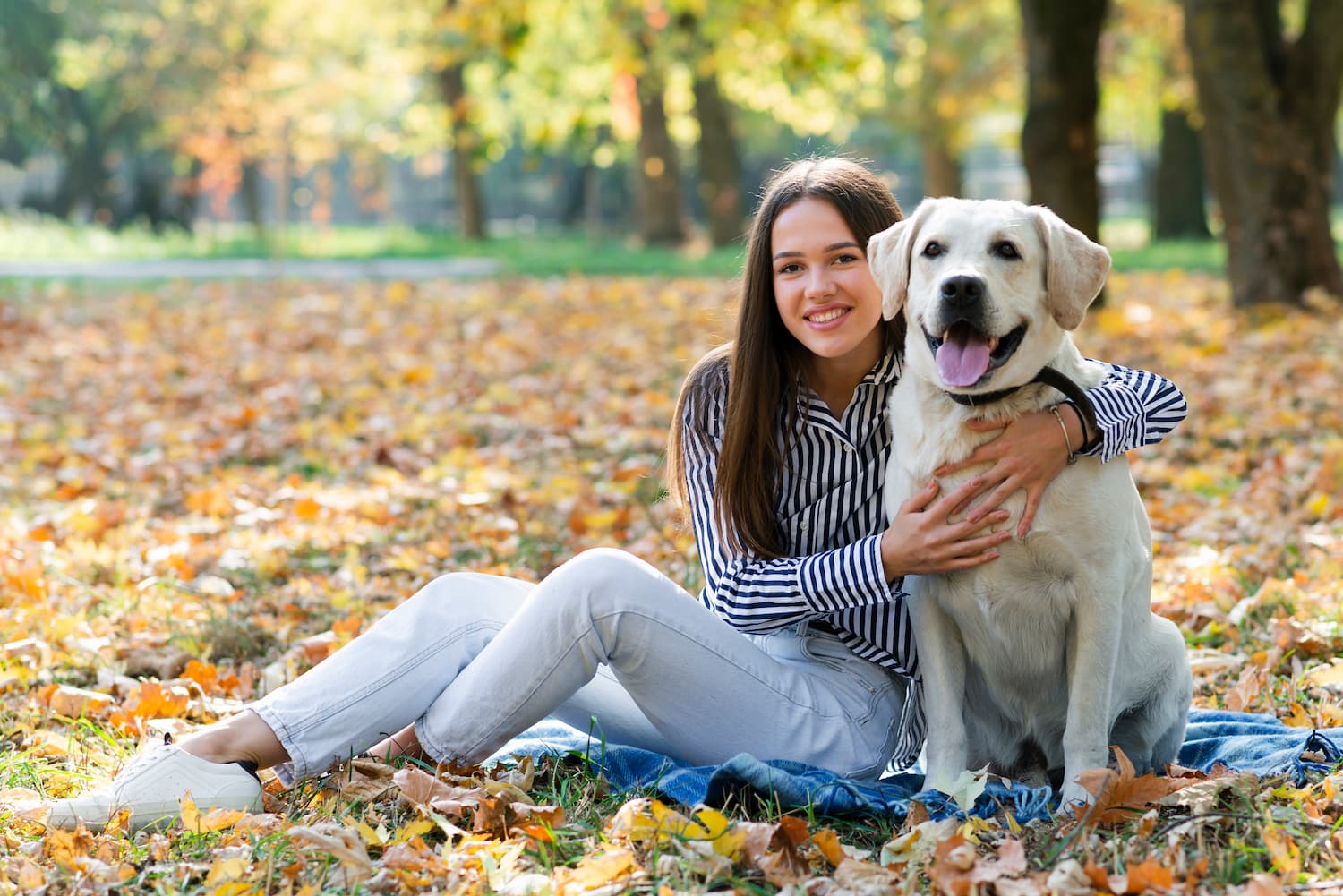 young woman hugging her dog1